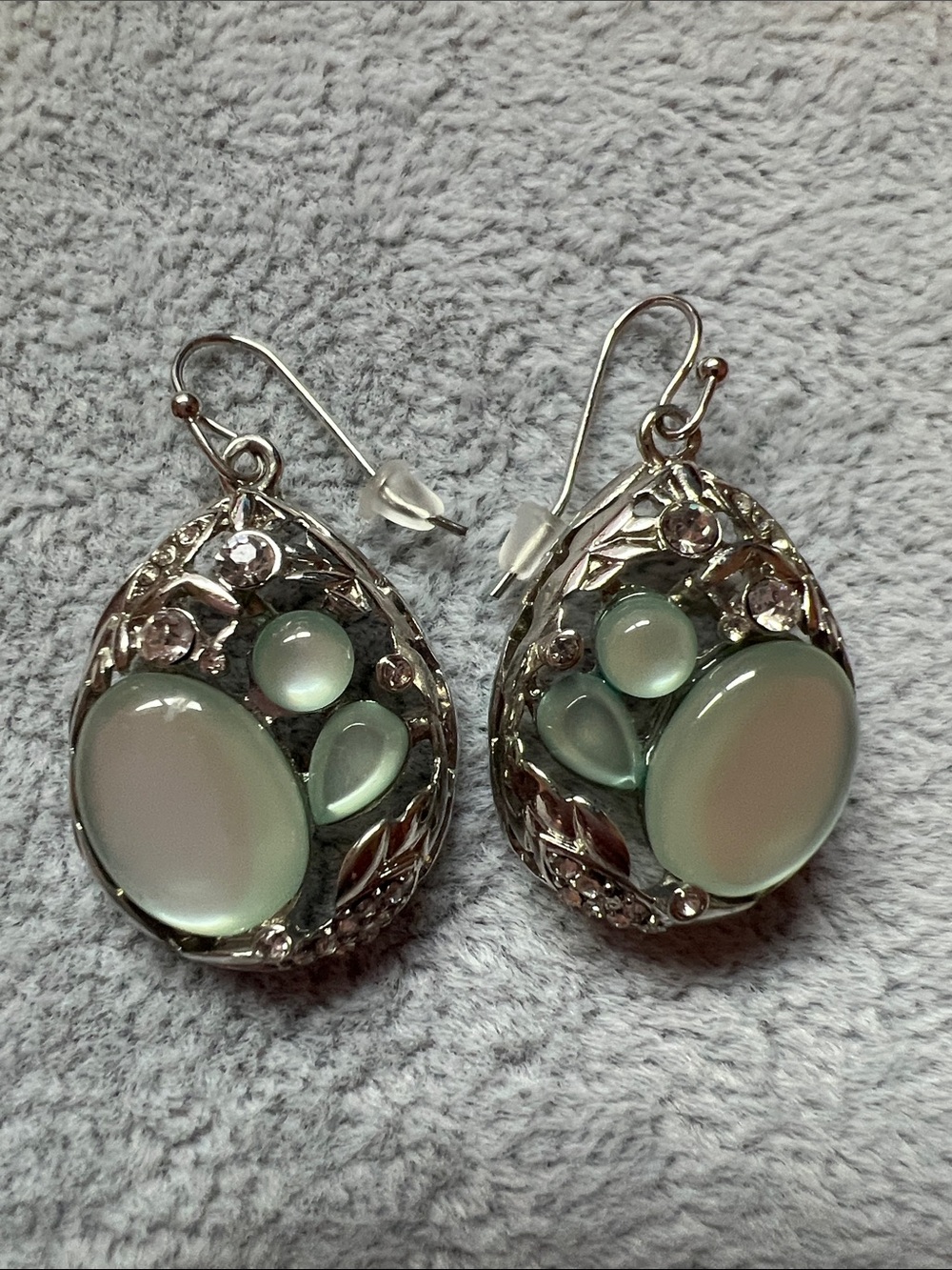 Silver-Tone Teardrop Earrings with Pale Green Opalescent Cabochons